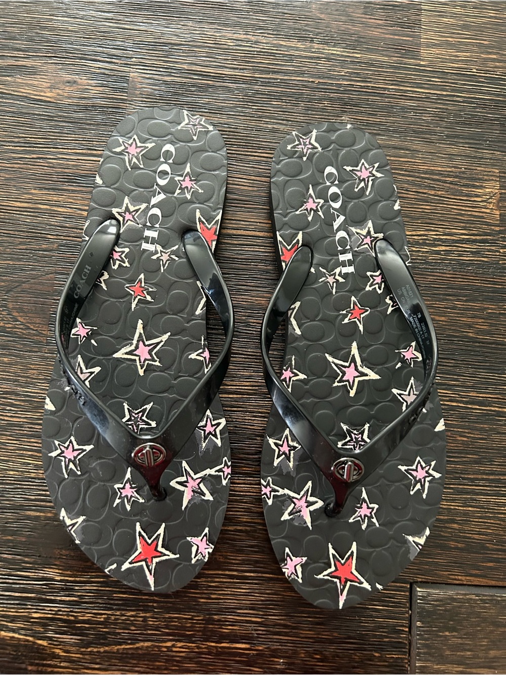 Coach Black Flip Flops with Pink & Red Star Print. Size 7.